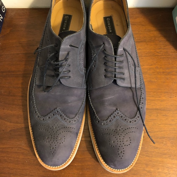 blue suede wingtip shoes